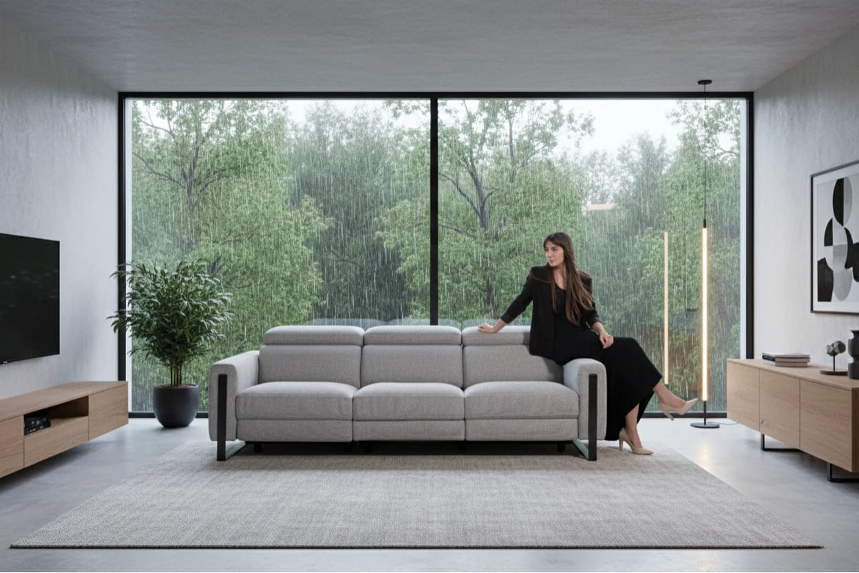 a woman on the edge of a sofa